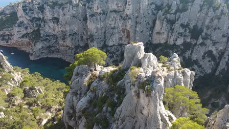 Amazing-drone-shot-flying-between-a-trees-and-rocks-discovering-two-man